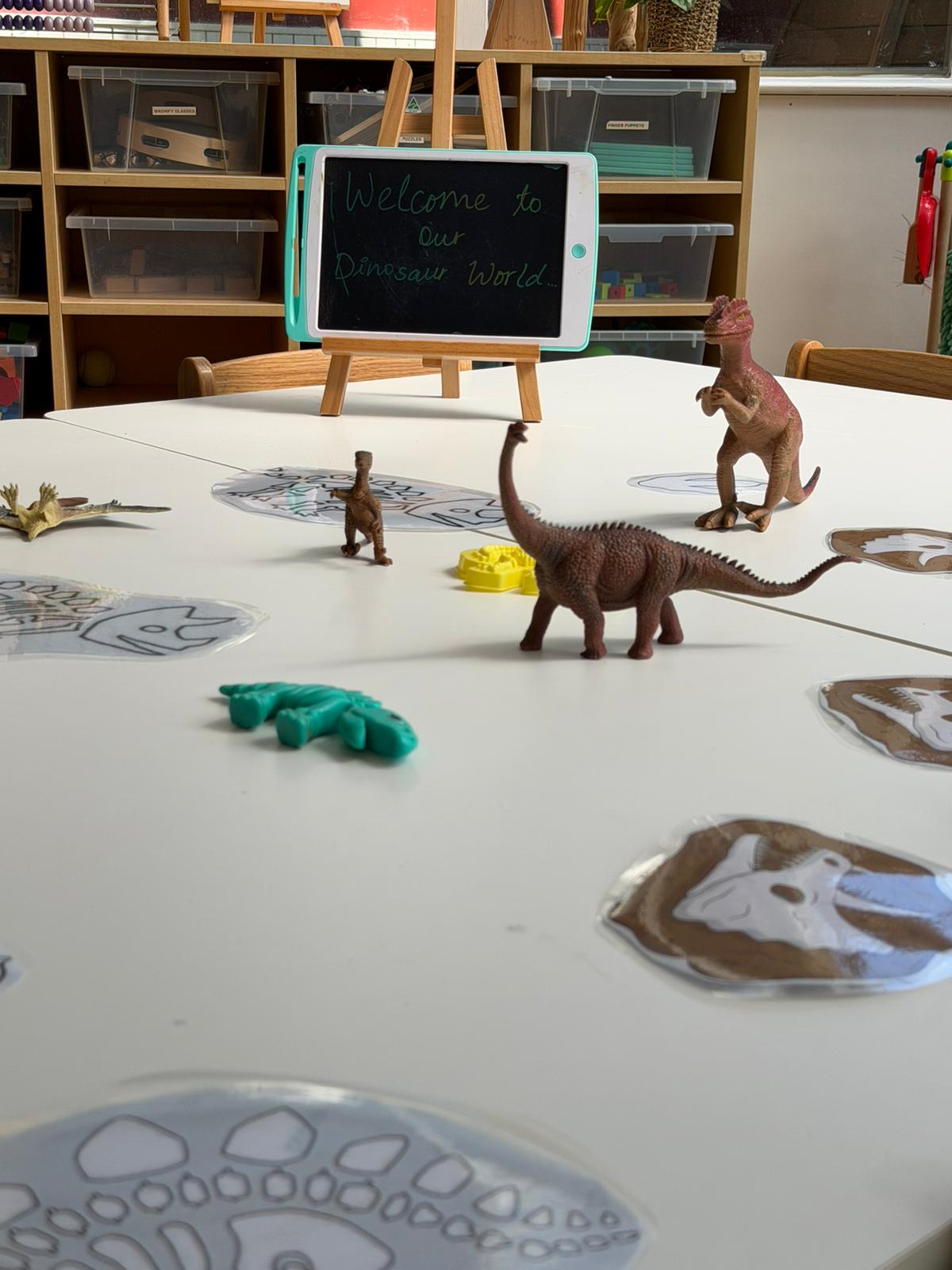 Small-world dinosaur learning invitation at Little Woods Early Learning in Glebe